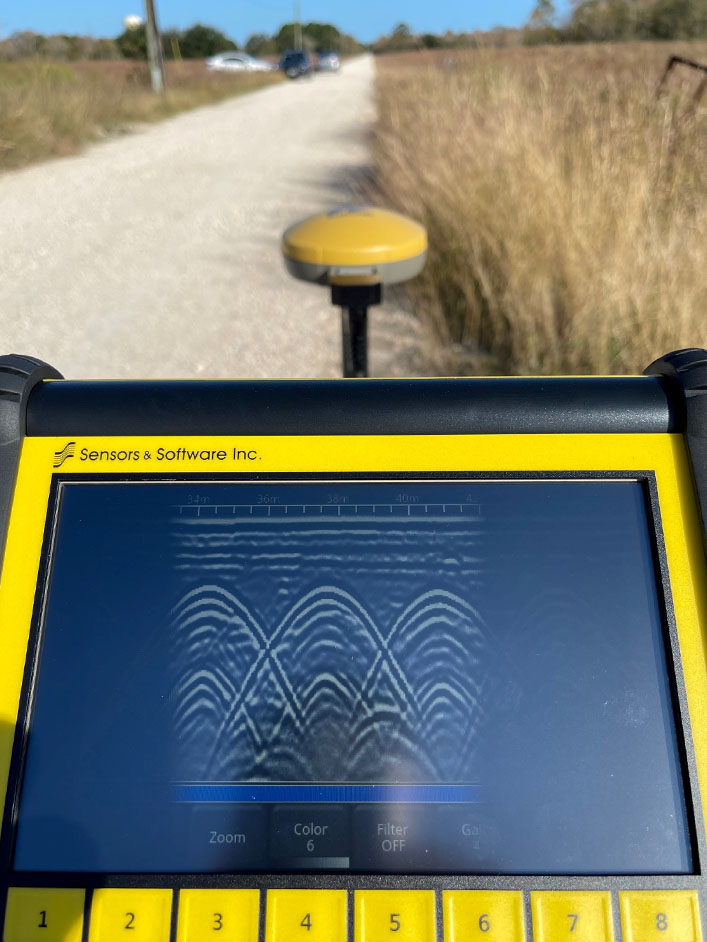 Machine conducting non-invasive seismic and ground-penetrating radar surveys at the Coastal Center.